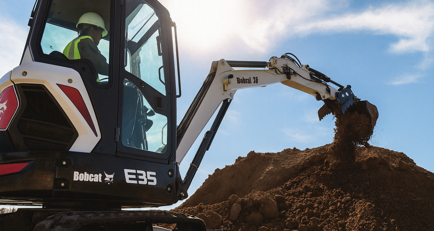 Bobcat E35 Excavator in Action – Specialty Excavation Services Operator using a Bobcat E35 excavator to move soil at a job site in South Dakota.